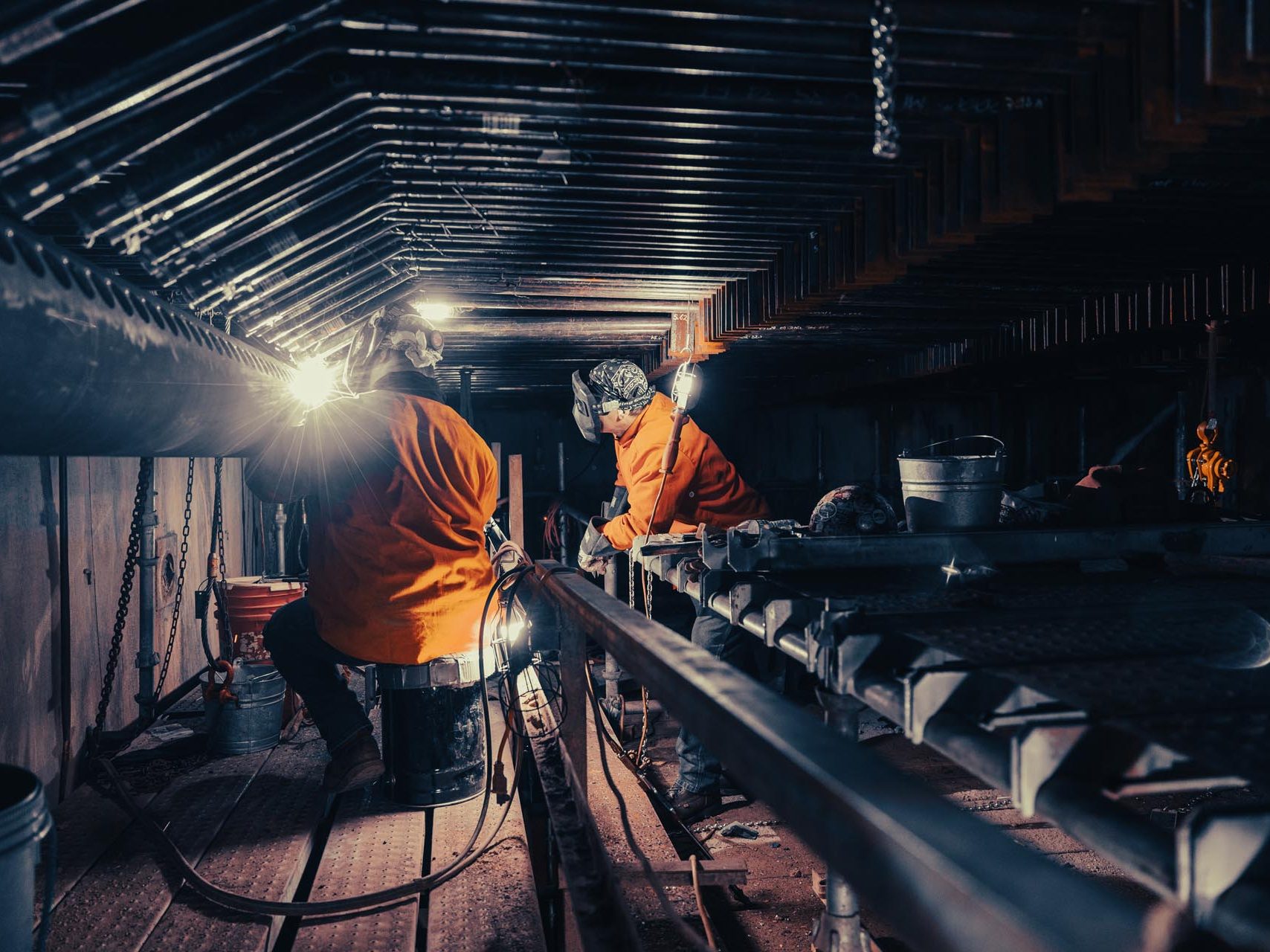 two men welding