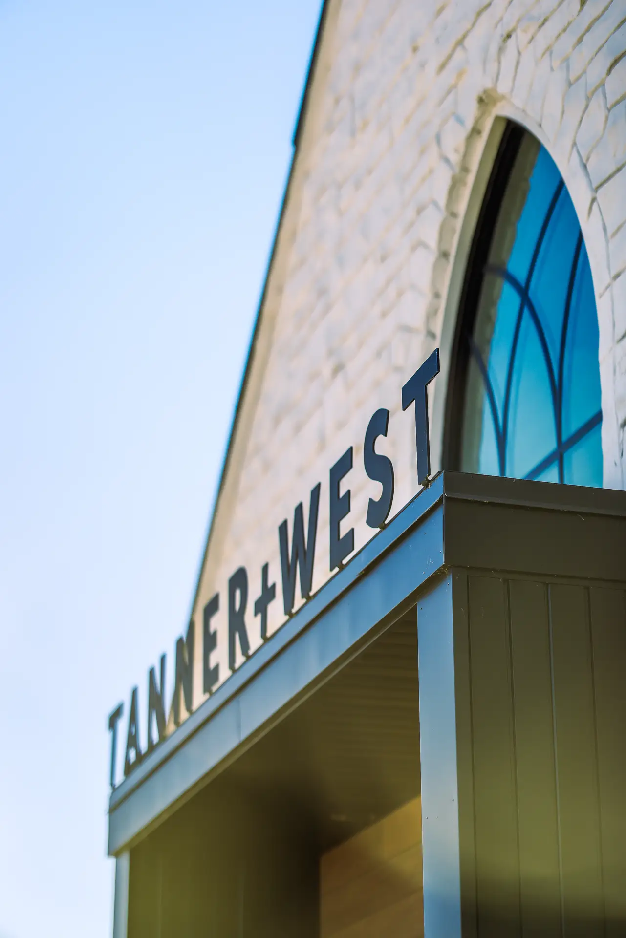 Tanner+West office front sign